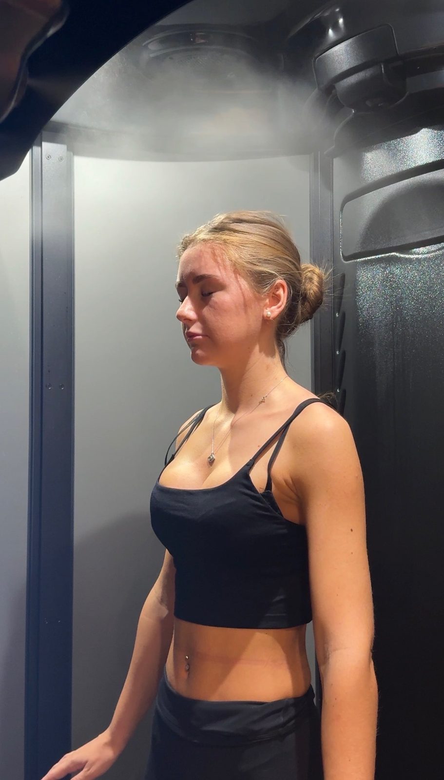 A full-body skincare session inside the WellFit booth
